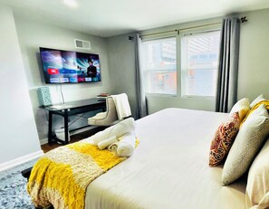 This unique home has 3 bedrooms. Climb into comfort in this king size bed on the 3rd floor. 