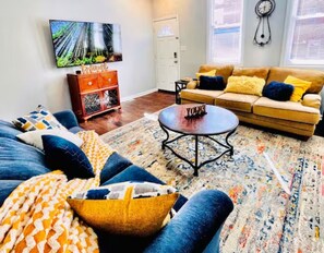 Three 50 inch TVs in the home. Streaming services available by entering your personal user info.