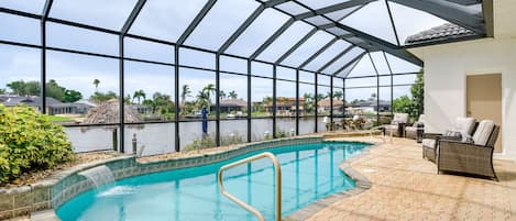 Cape Coral Vacation Rental | 4BR | 2.5BA | 2,775 Sq Ft | Small Step for Entry