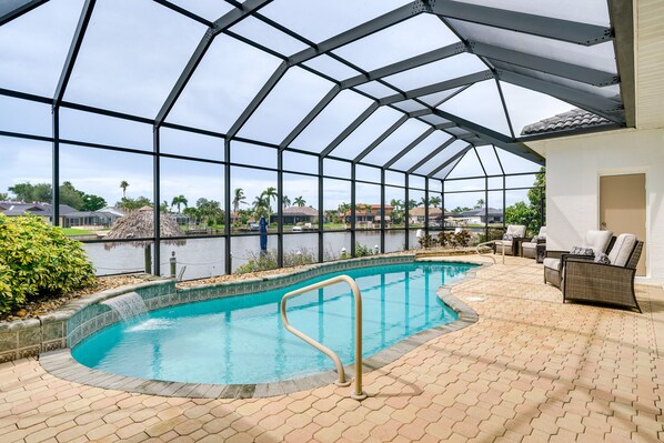 Cape Coral Vacation Rental | 4BR | 2.5BA | 2,775 Sq Ft | Small Step for Entry