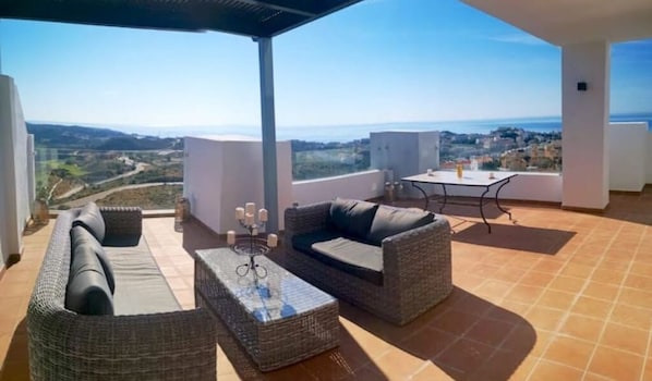 Wrap-around sun-drenched 90m2 corner terrace offering panoramic views of the sea