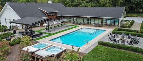 Backyard Oasis with Main House Heated Pool (open May 1-October 31), Hot Tubs (open all year long!), Pergola Lounge Area, Poolside Fire Pit & Sandbox for the Kiddos!